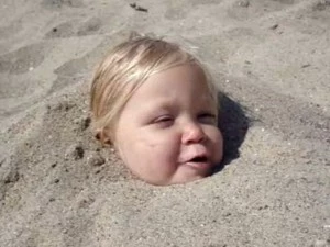 moresand Little girl wants more sand