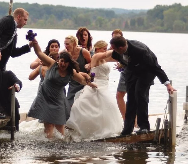 Bridal party falls into lake Bridal party falls into lake