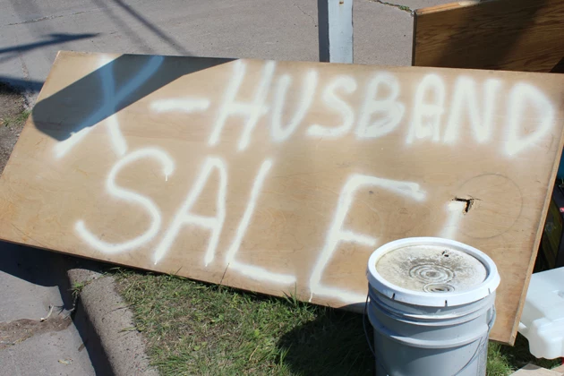 Woman in Superior, WI holds an ex-husband sale. Woman in Superior, WI holds an ex-husband sale.