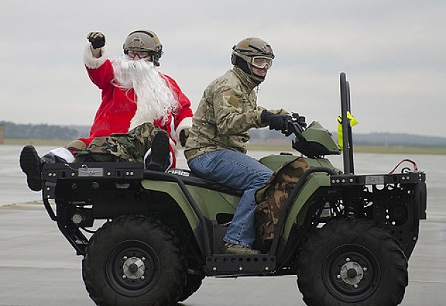Santa on the back of a ATV